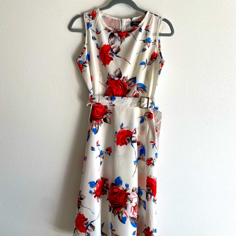 White dress with floral accents.